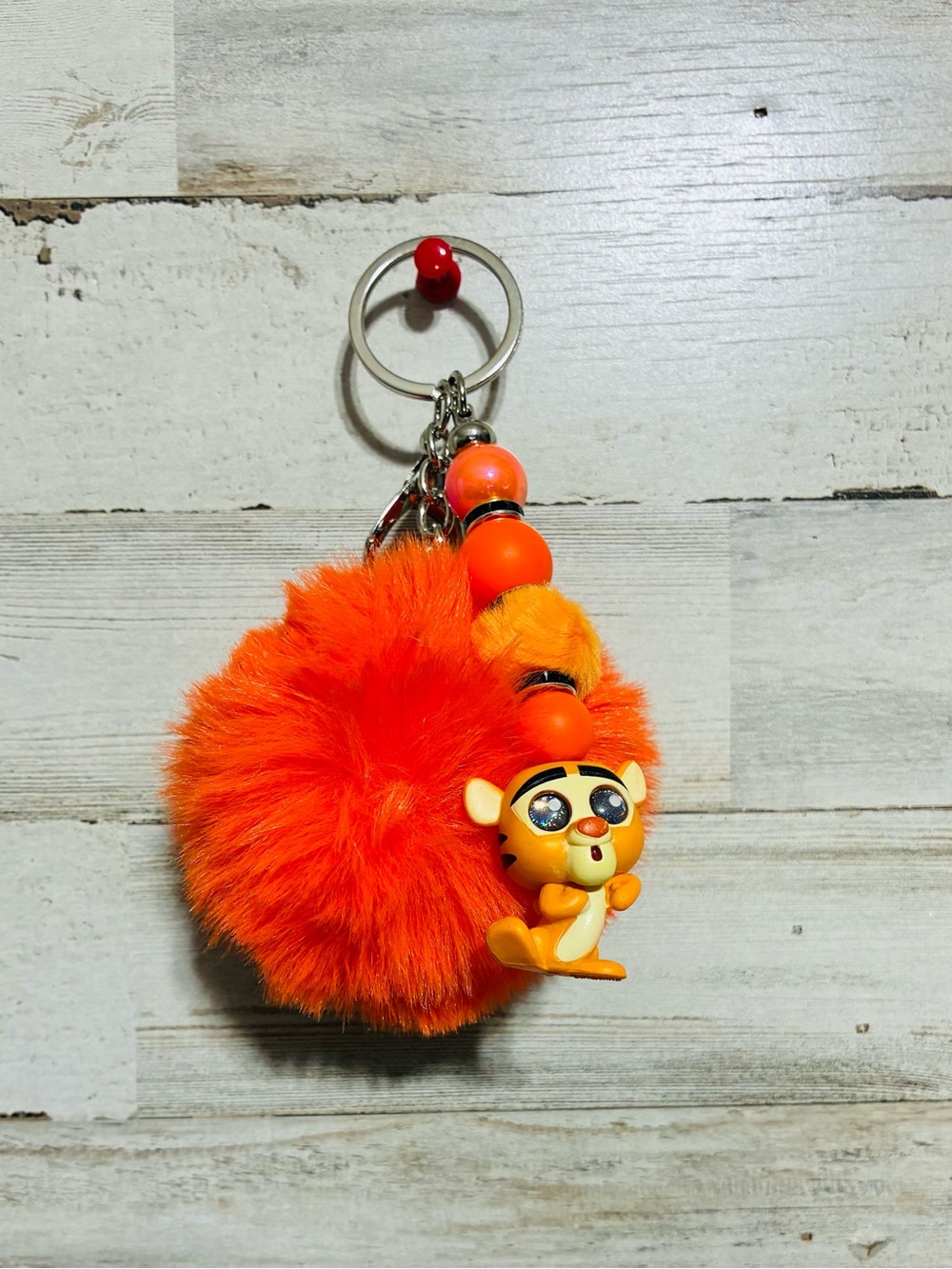 Disney Doorable Orange Plush Pom-Pom Keychain with Tigger Charm